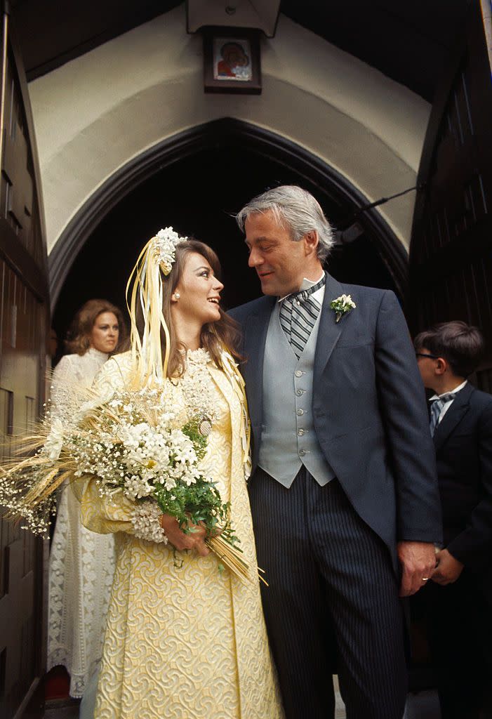 <p>Never one to be conventional, Natalie Wood chose a yellow embroidered dress, a matching coat, and a flower ribbon head piece for wedding to Richard Gregson. Though the bride stuck with one tradition: She carried a bouquet that included straws of wheat, a common Russian bridal custom. </p>