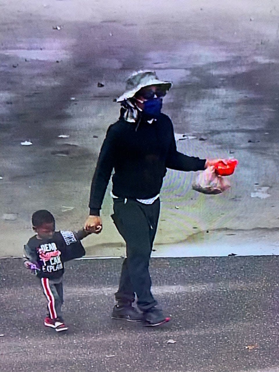 Security camera footage of a man abandoning an unnamed toddler at the Southaven Goodwill