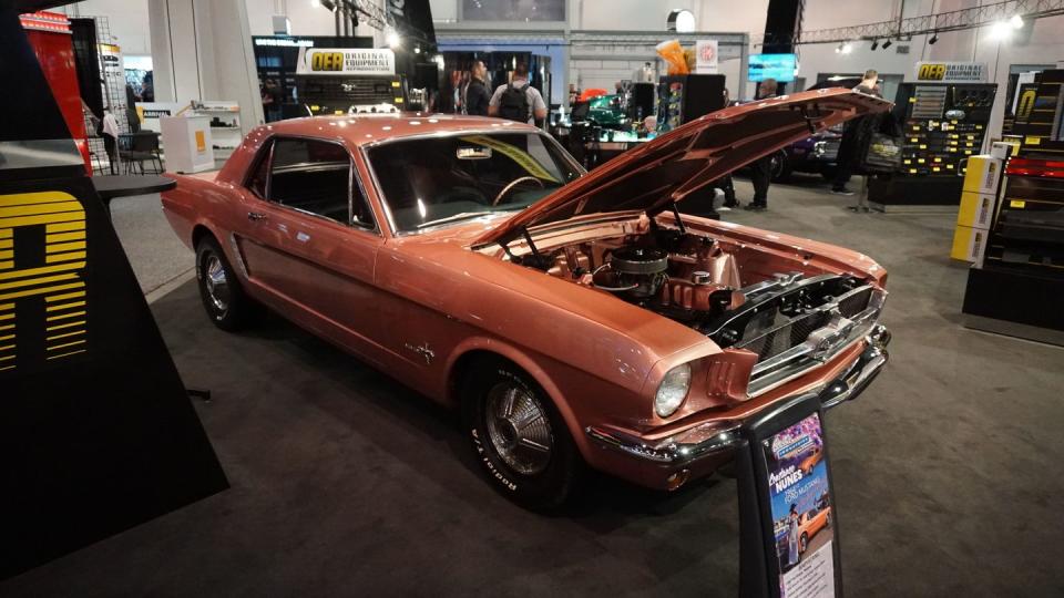 a ford mustang parked at the sema show