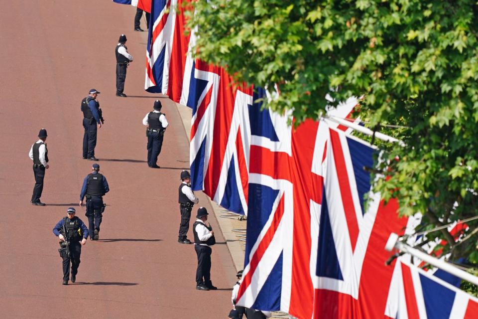 Police officers on The Mall ahead the Trooping the Colour ceremony (Dominic Lipinski/PA) (PA Wire)