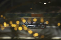 Mercedes driver Valtteri Bottas of Finland steers his car during the qualifying session at the Formula One Bahrain International Circuit in Sakhir, Bahrain, Saturday, Nov. 28, 2020. (Tolga Bozoglu, Pool via AP)