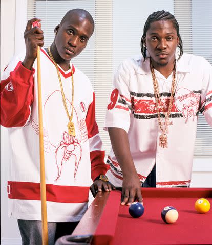 <p>Gregory Bojorquez/Getty Images</p> Pusha-T and Malice pose for a photo in 2003