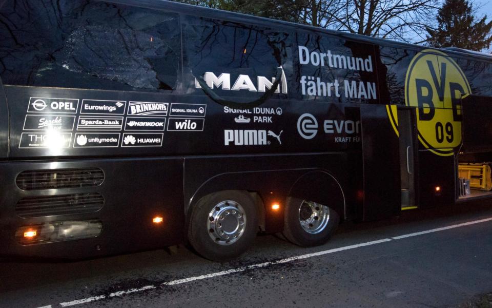 The damaged window of the Borussia Dortmund team bus - www.alamy.com