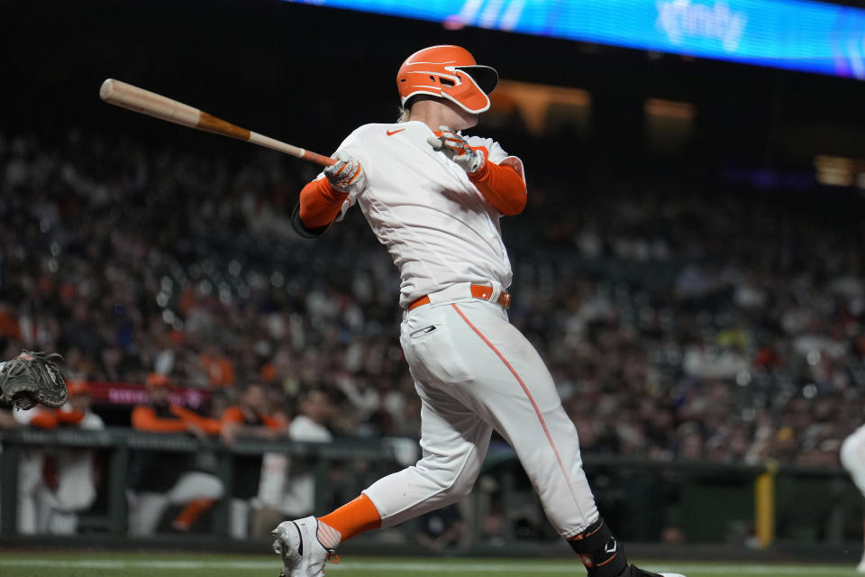 San Francisco Giants' Joc Pederson follows through on a three-run home run against the New York Mets during the eighth inning of a baseball game in San Francisco, Tuesday, May 24, 2022. (AP Photo/Tony Avelar)