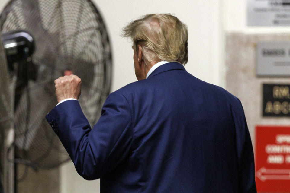 Former President Donald Trump gestures to reporters as he leaves the courtroom during a break in his trial, Tuesday, May 7, 2024 in New York. (Sarah Yenesel/Pool Photo via AP)