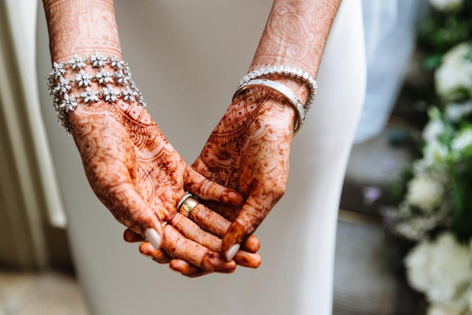 I was so in love with my mehndi. I got it done in London a few days before the wedding so that the color set. I loved how it looked with my Westwood gown.