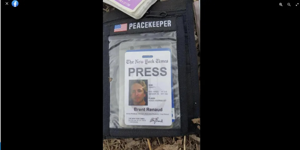 Brent Renaud&#39;s New York Times press pass in a pouch with a U.S. flag and labeled Peacekeeper.