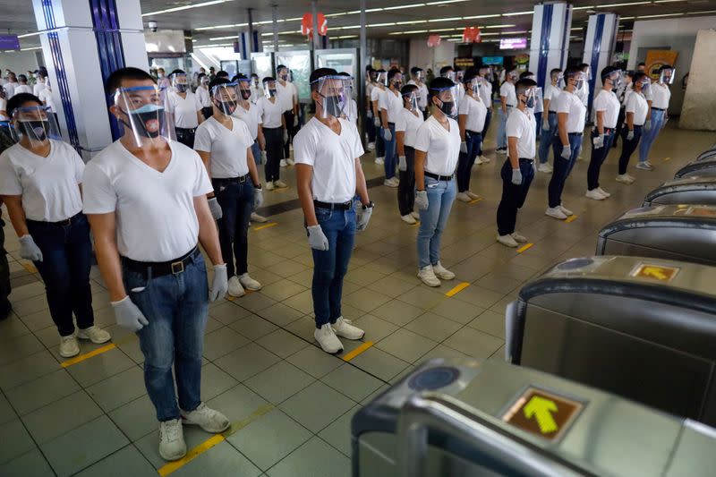 Philippines' police test runs new social distancing rules on public trains in the capital