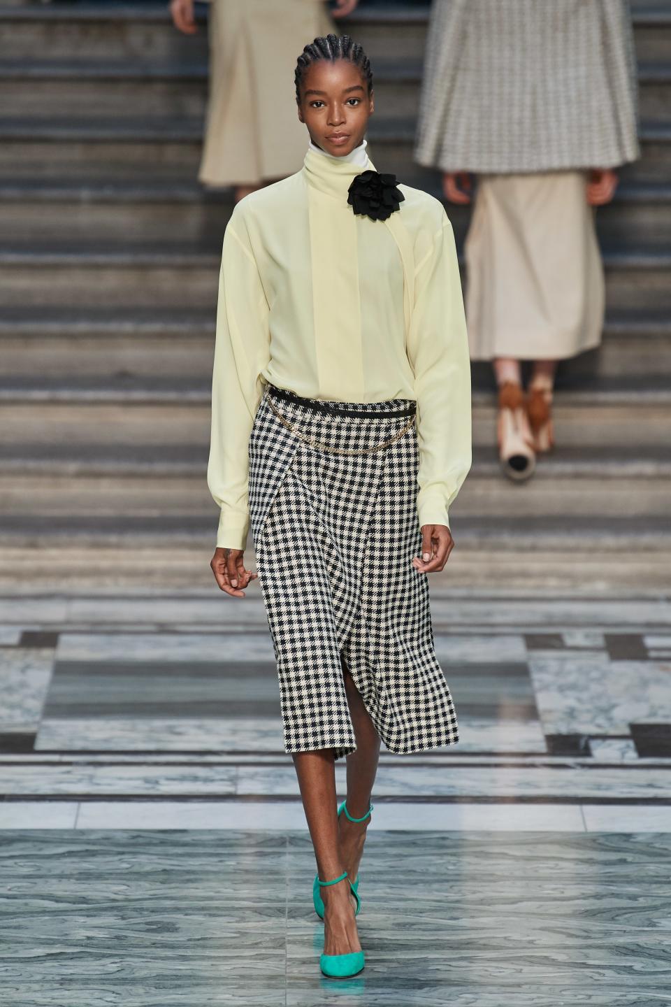 <h1 class="title">Victoria Beckham</h1><cite class="credit">Photo: GoRunway.com</cite>