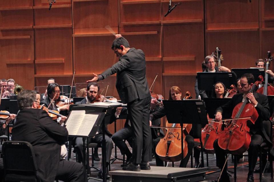 Charlotte Symphony guest conductor Vinay Parameswaran leads the orchestra in a February 2023 concert.