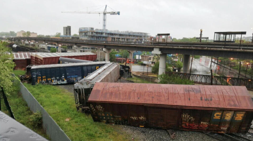 Several cars remain overturned