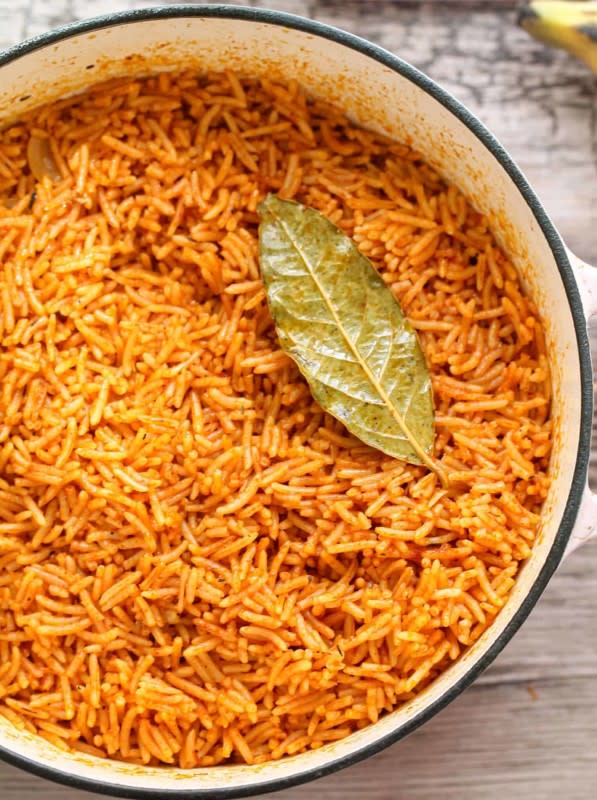 <p>Dash of Jazz</p><p>This Nigerian Jollof Rice recipe is easy to make for a hearty dish or dinner. It includes red bell peppers, tomatoes, onions, and spicy peppers. Serve jollof rice with chicken, or your favorite protein.</p><p><strong>Get the Recipe</strong>: <a href="https://simshomekitchen.com/nigerian-jollof-rice-recipe/" rel="nofollow noopener" target="_blank" data-ylk="slk:Jollof Rice;elm:context_link;itc:0;sec:content-canvas" class="link "><strong>Jollof Rice</strong></a></p>