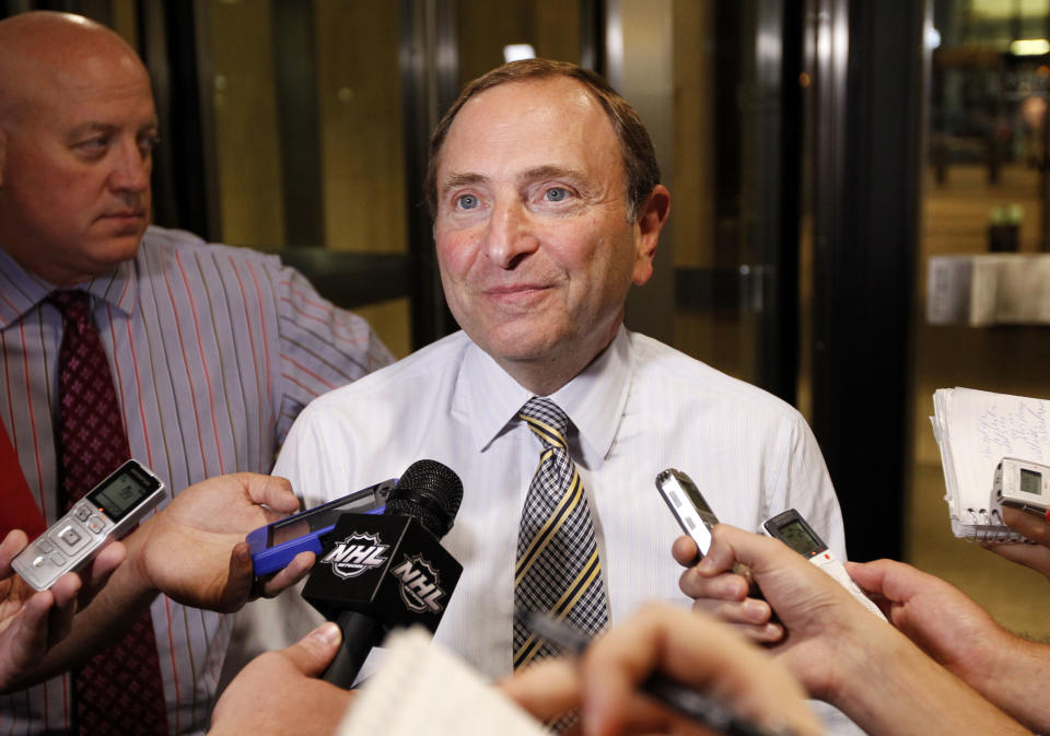 NHL Commissioner Gary Bettman speaks to reporters after a negotiation session between the league and the NHL Players' Association, Wednesday, July 18, 2012, in New York. (AP Photo/Jason DeCrow)