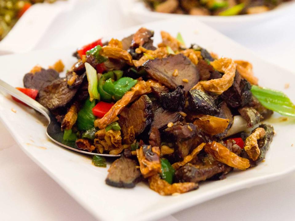 <p>Serious Eats / Max Falkowitz</p> Smoked beef with crisp dried chiles—Hunan cooking is all about spicy, savory flavors. 