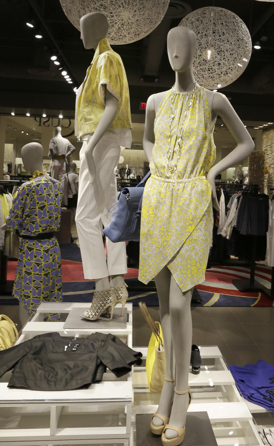 This March 6, 2014 photo shows spring fashions displayed at the Neiman Marcus NorthPark Center store in Dallas. (AP Photo/LM Otero)