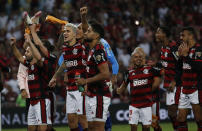 Players of Brazil's Flamengo celebrate winning 2-1 against Argentina's Velez Sarsfield at the end of a Copa Libertadores semifinal second leg soccer match at Maracana stadium in Rio de Janeiro, Brazil, Wednesday, Sept. 7, 2022. Brazil's Flamengo qualified to the final. (AP Photo/Bruna Prado)