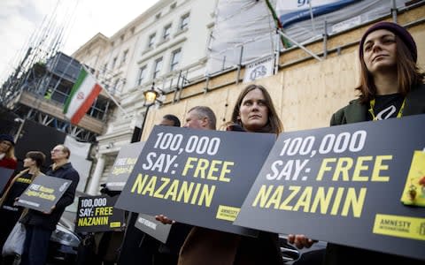 Protesters delivered a petition and a letter demanding Mrs Zaghari-Ratcliffe's release to the Iranian embassy on Wednesday.  - Credit: TOLGA AKMEN/AFP