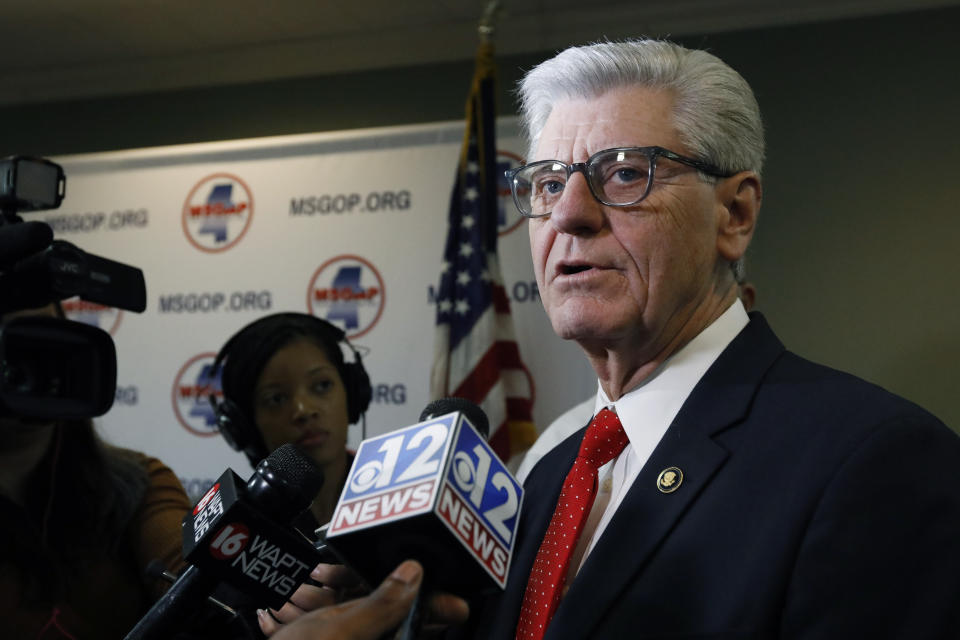 Gov. Phil Bryant discusses with reporters, his concerns about the recent violence at the state penitentiary in Parchman, Monday, Jan. 6, 2020, in Jackson, Miss. (AP Photo/Rogelio V. Solis)