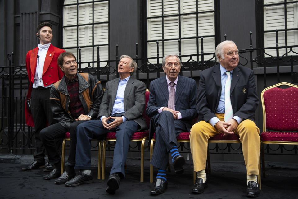 (seated left to right) Sir Cliff Richard, Tommy Steele, Des OÕConnor and Jimmy Tarbuck, as they wait to reveal the Wall of Fame, a new art installation at the London Palladium in London.