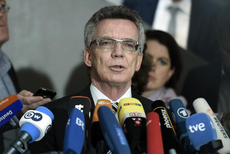 German Interior Minister Thomas de Maiziere -- who oversaw the spy services from 2005-09 -- speaks to journalists after he arrives to attend a meeting in Berlin, on May 6, 2015