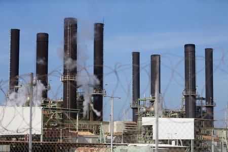 A view shows Gaza's power plant through a barbed fence in the central Gaza Strip January 16, 2017. REUTERS/Ibraheem Abu Mustafa