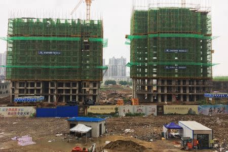 A construction site of residential buildings is seen in Bengbu, Anhui province, China July 9, 2017. REUTERS/Yawen Chen