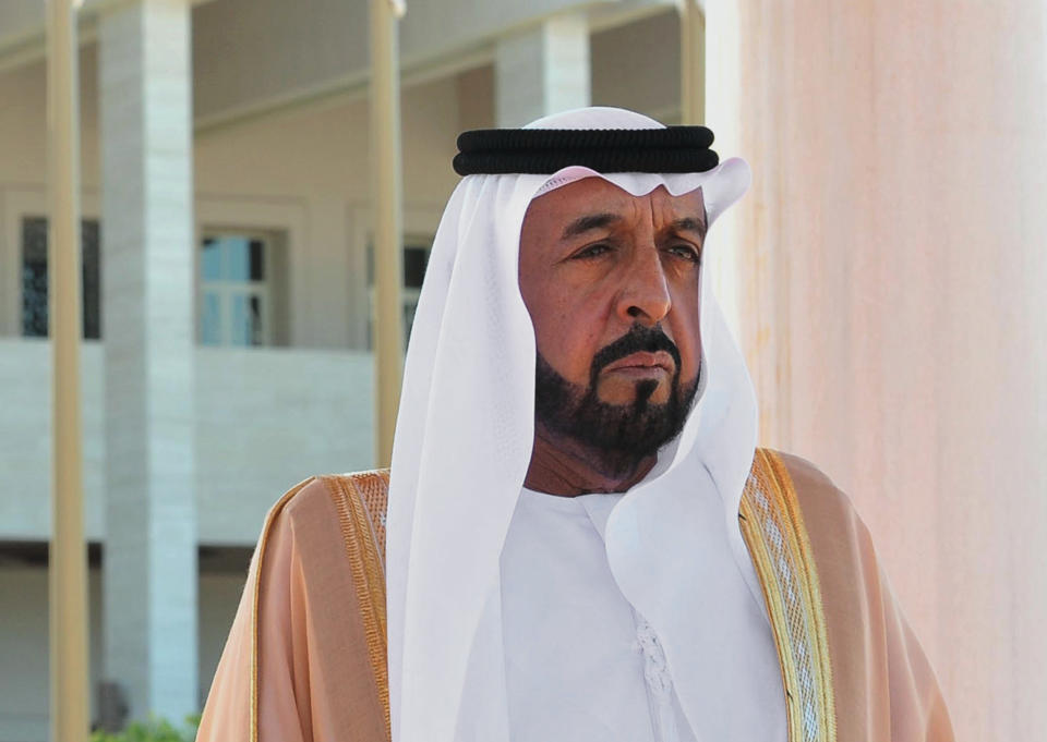 FILE - In this Monday, Jan. 30, 2012 file photo released by the Turkish Presidency Press Office, Sheik Khalifa bin Zayed Al Nahyan, president of the United Arab Emirates (UAE), listens to the national anthem during a ceremony with Turkey's President Abdullah Gul in Abu Dhabi, UAE. A senior Emirati official says the health of the federation's president is "stable and reassuring" following a stroke he suffered last month. (AP Photo/Murat Cetinmuhurdar, Turkish Presidency Press Office, File)