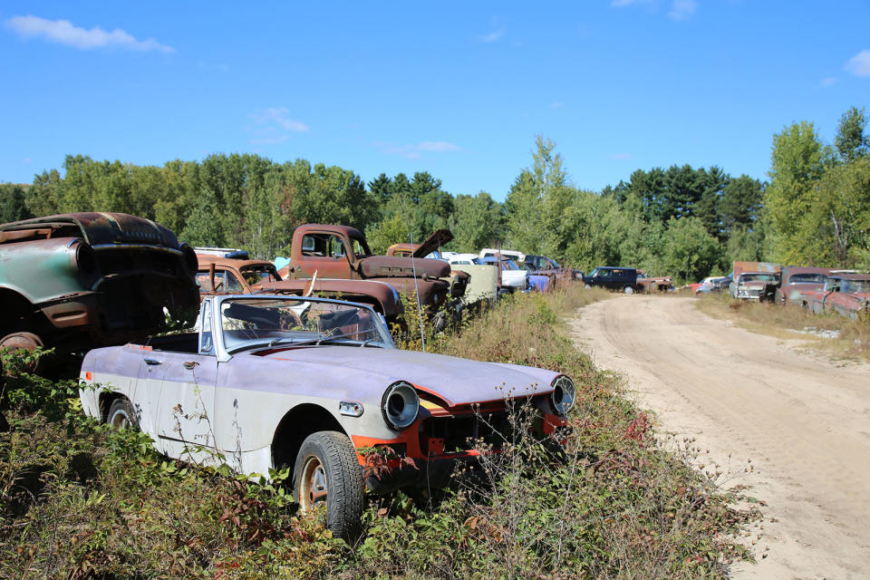 <p>At some point in its life, this once orange MG Midget 1500 was subjected to an incredibly poor respray. Whoever carried out the work couldn’t even be bothered to open the hood, let alone remove the side marker lights and rubber front bumper.</p><p>Due to strict emissions regulations, MG-owner British Leyland was only able to squeeze <strong>56 hp</strong> out of the 1493cc engine, which meant it took more than 14sec to reach 60mph. </p>