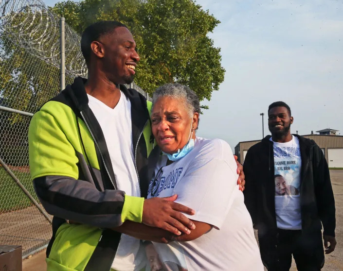 Doris Williams, 65, right, is overcome with emotion when her son Marlin Dixon, left, is released from the John C. Burke Correctional Center. About a dozen people were in Waupun for Dixon's release after 18 years of incarceration.