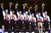 23 Jul 1996: General view of the United States women''s gymnastics team after winning the gold medal in team optionals at the Summer Olympics in the Georgia Dome in Atlanta, Georgia. Mandatory Credit: Doug Pensinger /Allsport