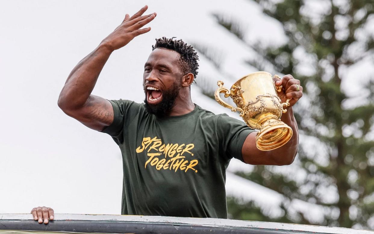 Captain Siya Kolisi shows off the Webb Ellis trophy at the Springboks’ World Cup winners celebration in East London, South Africa