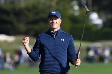 February 12, 2017; Pebble Beach, CA, USA; Jordan Spieth celebrates after making his putt on the 18th hole during the final round of the AT&T Pebble Beach Pro-Am golf tournament at Pebble Beach Golf Links. Mandatory Credit: Kyle Terada-USA TODAY Sports