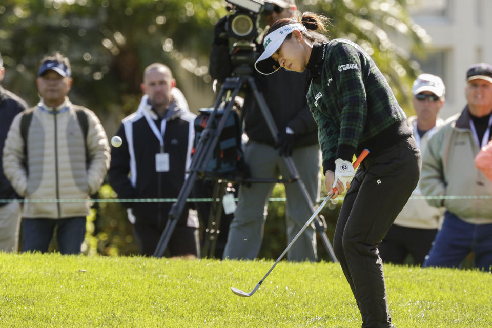 Lydia Ko, chips onto the seventh green during the final round of the Hilton Grand Vacations Tournament of Champions LPGA golf tournament in Orlando, Fla., Sunday, Jan. 21, 2024. (AP Photo/Kevin Kolczynski)