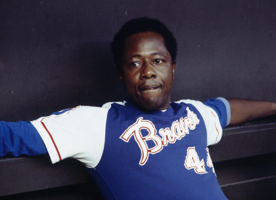 <span class="caption">Slugger Hank Aaron went along with the team to Atlanta only after some lobbying from Martin Luther King Jr.</span> <span class="attribution"><a class="link " href="https://www.gettyimages.com/detail/news-photo/outfielder-hank-aaron-of-the-atlanta-braves-relaxes-in-the-news-photo/51455615?adppopup=true" rel="nofollow noopener" target="_blank" data-ylk="slk:Focus on Sport via Getty Images;elm:context_link;itc:0;sec:content-canvas">Focus on Sport via Getty Images</a></span>