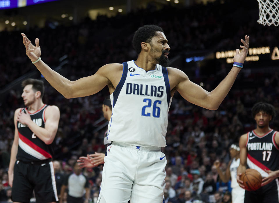 Dallas Mavericks guard Spencer Dinwiddie reacts after being fouled during the first half of an NBA basketball game against the Portland Trail Blazers in Portland, Ore., Sunday, Jan. 15, 2023. (AP Photo/Craig Mitchelldyer)