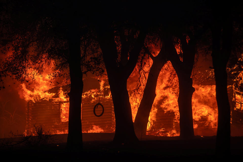 A house burns during the Zogg Fire near Igo, CaliforniaAdam Gray/SWNS