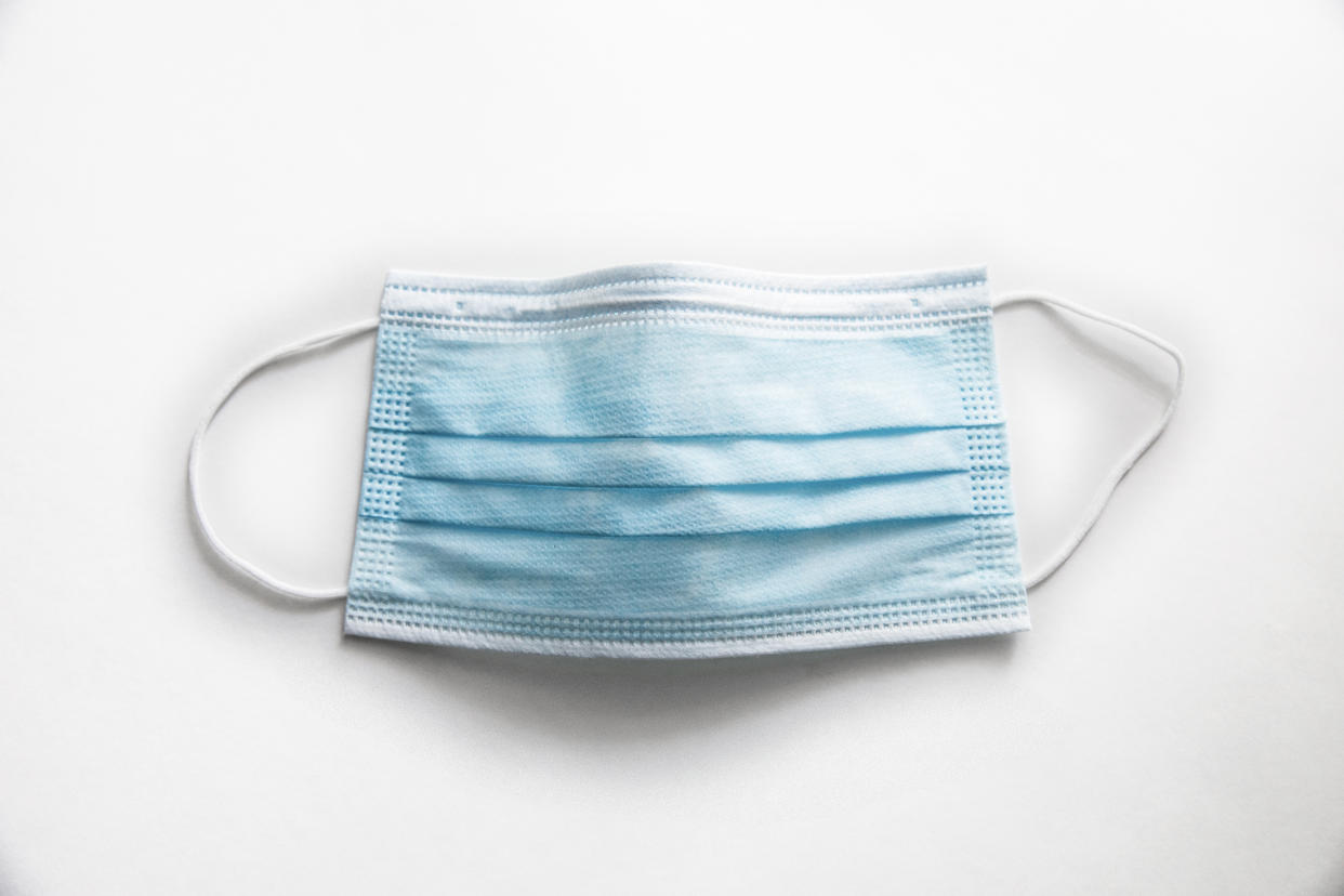 Surgical mask on white background