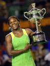 American Serena Williams holds the winner's trophy during the presentation ceremony after her victory over Russia's Maria Sharapova in the Women's Singles final at the 2007 Australian Open tennis tournament at Rod Laver Arena at Melbourne Park. Williams, ranked 81 in the world, defeated top seed Sharapova in straight sets, 6-1, 6-2, 27 January 2007. (Photo by Viki Lascaris/Fairfax Media via Getty Images)