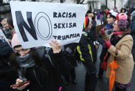 <p>Some 200 activists of women’s organizations and women’s rights slogans walk from the office of Prime Minister to the U.S. Embassy in Warsaw, Poland, Saturday, Jan. 21, 2017, in support of the Women’s March in Washington and protests around the globe saying they were concerned about the rhetoric that was raised in President Donald Trump’s campaign. (AP Photo/Czarek Sokolowski) </p>