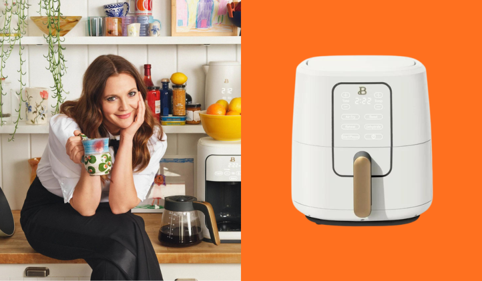 drew barrymore holding a mug next to some kitchen appliances / the air fryer in white