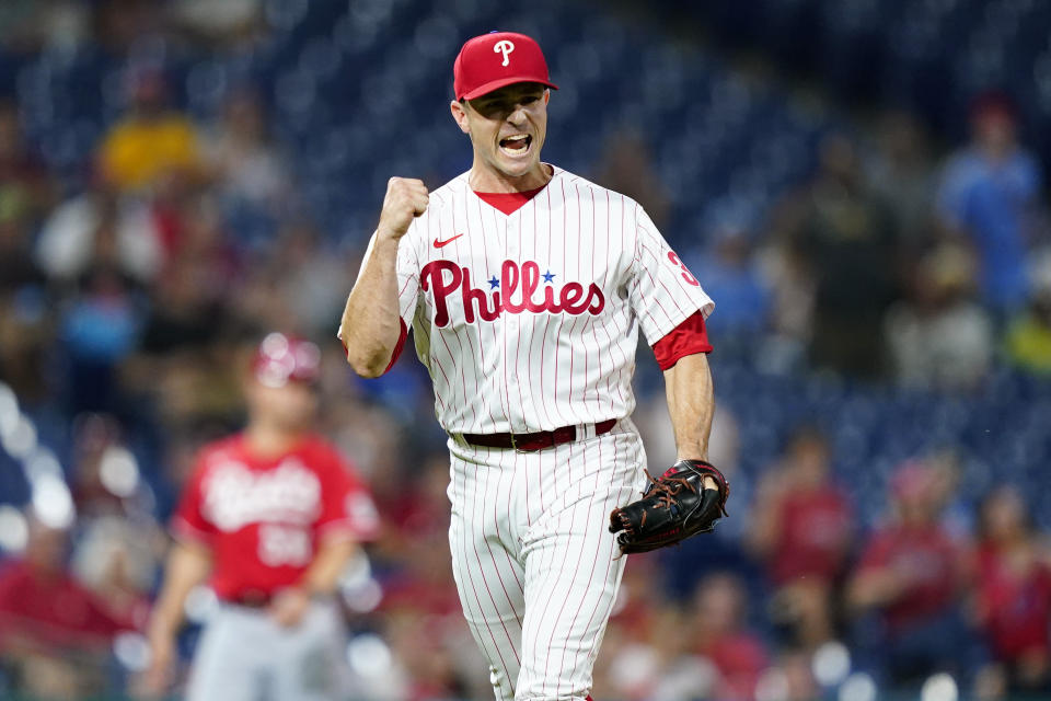 Philadelphia Phillies pitcher David Robertson reacts after getting Cincinnati Reds' Kyle Farmer to ground into a double play to end their baseball game, Wednesday, Aug. 24, 2022, in Philadelphia. (AP Photo/Matt Slocum)