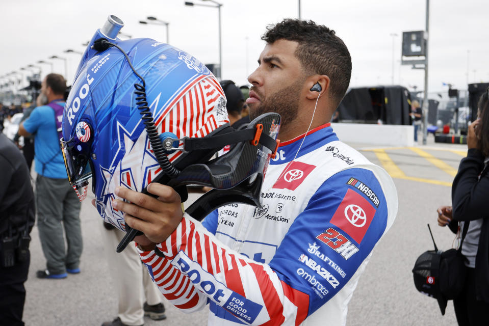 Bubba Wallace prepares for qualifying for the NASCAR Cup Series auto race at Kansas Speedway in Kansas City, Kan., Saturday, Sept. 10, 2022. (AP Photo/Colin E. Braley)