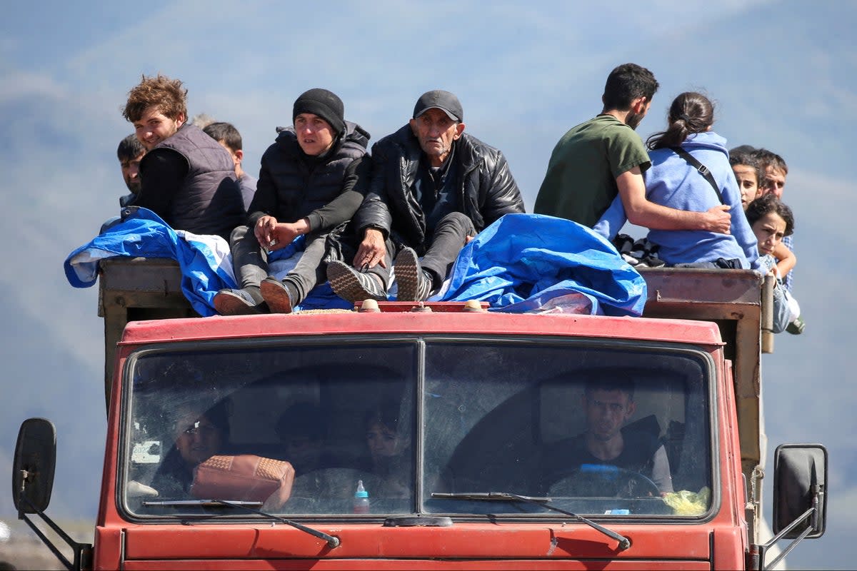 Ethnic Armenians have been fleeing Nagorno-Karabakh (Irakli Gedenidze/Reuters)