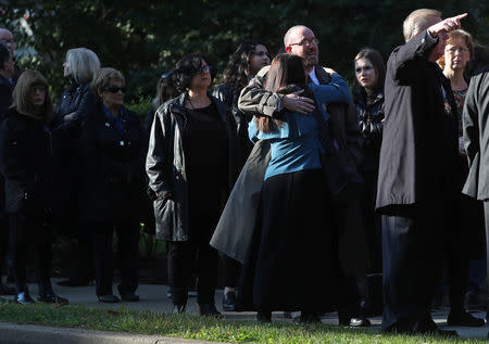 Mourners line up to pay their respects at visitation services for brothers Cecil and David Rosenthal, victims of the Tree of Life Synagogue shooting, at Rodef Shalom Temple in Pittsburgh, Pennsylvania, U.S., October 30, 2018. REUTERS/Cathal McNaughton