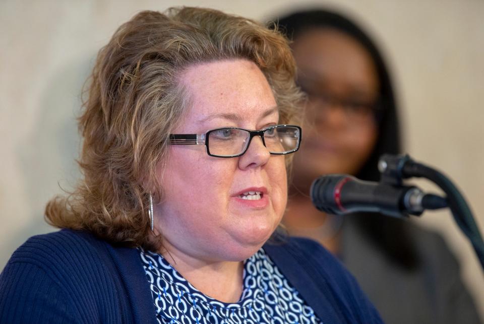 Amy Nelson (left), Fair Housing Center of Central Indiana, speaks during a news conference to announce a program to protect renters' rights, Indianapolis, Wednesday, Jan. 15, 2020.