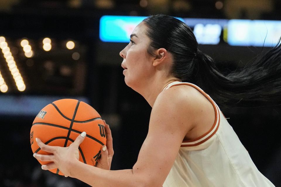 Shaylee Gonzales takes aim at the basket during a 21-point performance in Texas' 82-42 NCAA first-round rout of Drexel.