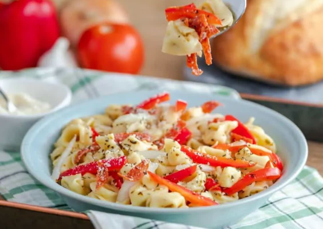 <p>Mama Needs Cake</p><p>This cheese-stuffed tortellini pasta is absolutely delicious mixed with Italian seasonings, crispy red peppers, onions, and flavorful sliced pepperonis. It's a bright and colorful dish that is perfect when we approach the warmer months.</p><p><strong>Get the recipe: <a href="https://mamaneedscake.com/instant-pot-peppers-cheese-tortellini-pasta-salad/" rel="nofollow noopener" target="_blank" data-ylk="slk:Instant Pot Peppers and Cheese Tortellini Pasta Salad;elm:context_link;itc:0;sec:content-canvas" class="link rapid-noclick-resp">Instant Pot Peppers and Cheese Tortellini Pasta Salad</a></strong></p>