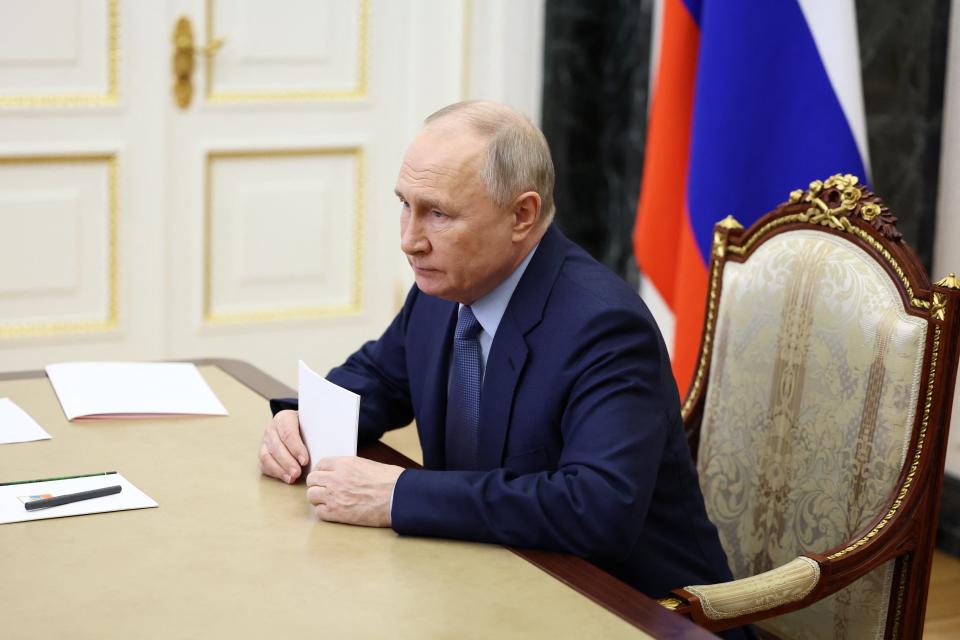 In this pool photograph distributed by Russian state agency Sputnik, Russia's President Vladimir Putin chairs a meeting on economic issues via a videoconference at the Kremlin in Moscow on February 12, 2024 (POOL/AFP via Getty Images)