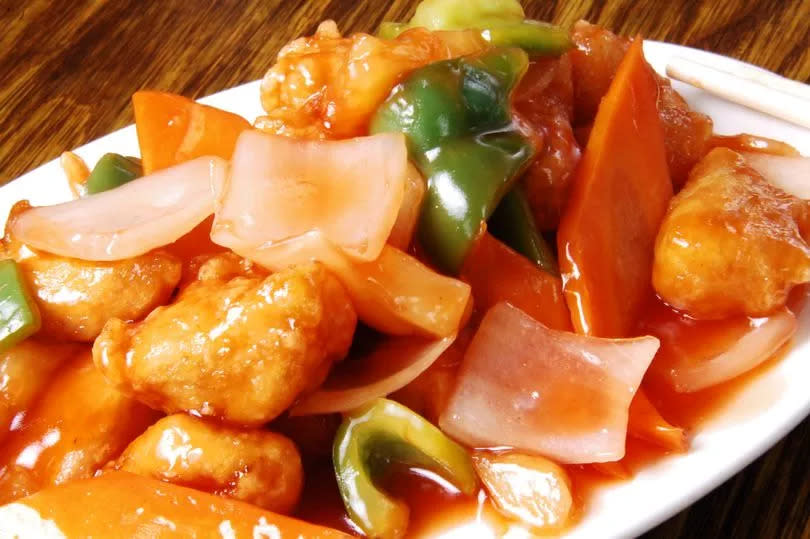 Chinese sweat and sour dish at a  restaurant, menu photograph for advertising