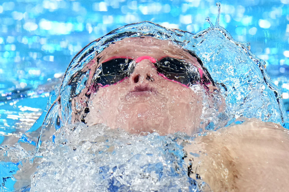 Claire Curzan of the United States swims to win the women's 200 meters backstroke final at the World Aquatics Championships in Doha, Qatar, Saturday, Feb. 17, 2024. (AP Photo/Hassan Ammar)